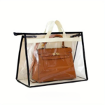 Rangement sac à main de transport pratique transparent, sur un fond blanc.