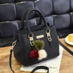 Sac à main noir avec pompon vintage noir