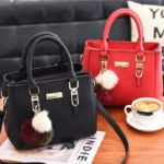 Sac à main noir avec pompon vintage noir et rouge