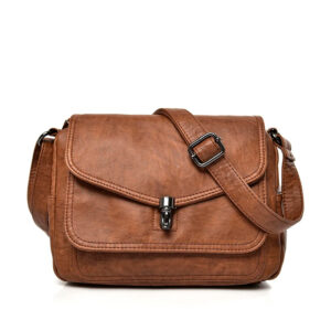 Petit sac à main chic style vintage sur fond blanc