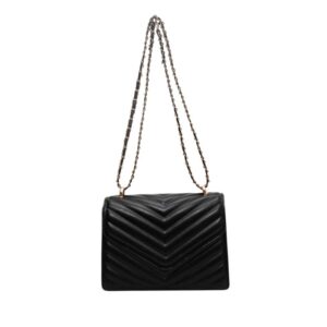 Petit sac à main discret et raffiné sur fond blanc