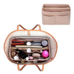 Rangement sac à main rose multi espaces, sur un fond blanc ouvert avec vue sur l'intérieur