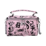 Sac à main original rose c avec des graffitis noirs, vaec des motifs tour eiffel
