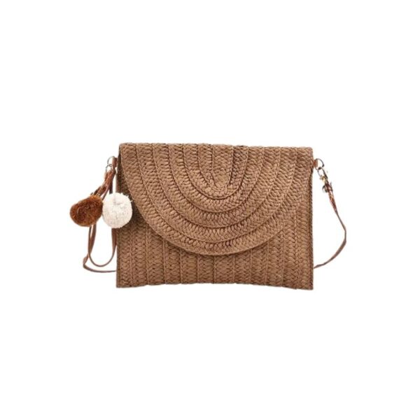 Sac à main pochette élégant en paille sur fond blanc