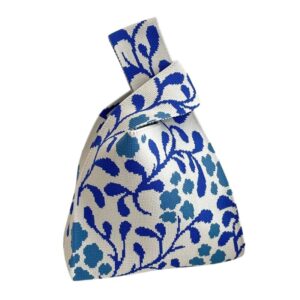 Sac à main tissus chic et raffiné à motifs bleus sur fond blanc