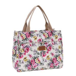 Sac à main tissus raffiné orné de motifs floraux sur fond blanc