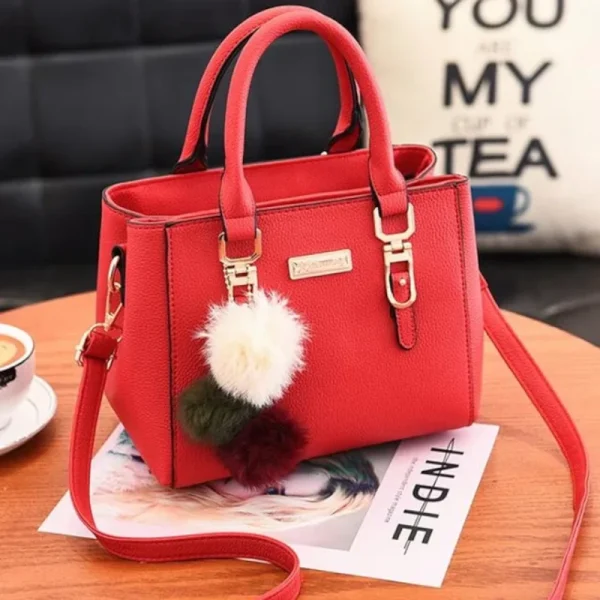 Sac main noir pompon vintage 03 Sac à main noir avec pompon vintage rouge