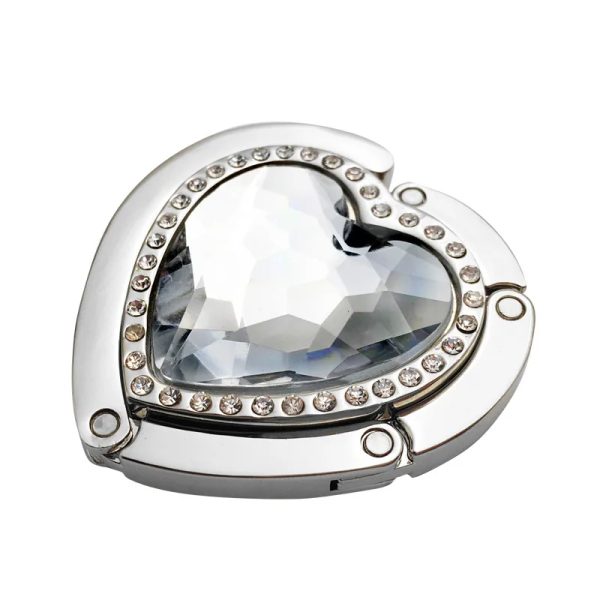 accroche-sac-main-pliable-forme-coeur-03 Accroche sac à main pliable en forme de cœur argent sur fond blanc