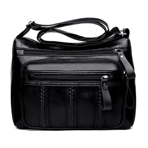 sac-main-bandouliere-details-raffines-01 Sac à main bandoulière avec détails raffinés sur fond blanc