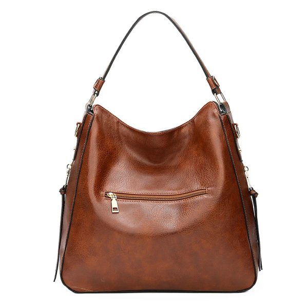 sac-main-camel-elegant-style-vintage-01 Sac à main camel élégant style vintage sur fond blanc