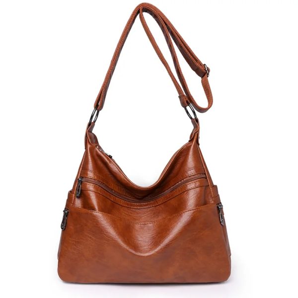 sac-main-camel-luxueux-bandouliere-01 Sac à main camel luxueux avec bandoulière sur fond blanc