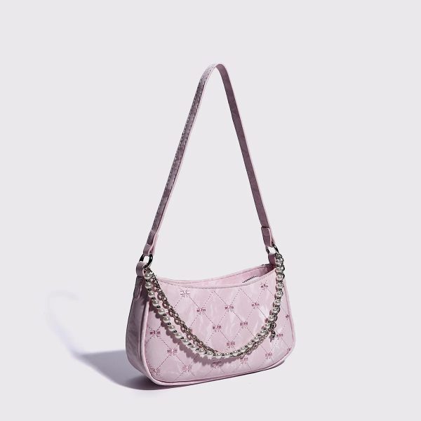 sac-main-rose-elegant-style-luxueux-02 Sac à main rose élégant au style luxueux avec sa bandoulière dépliée